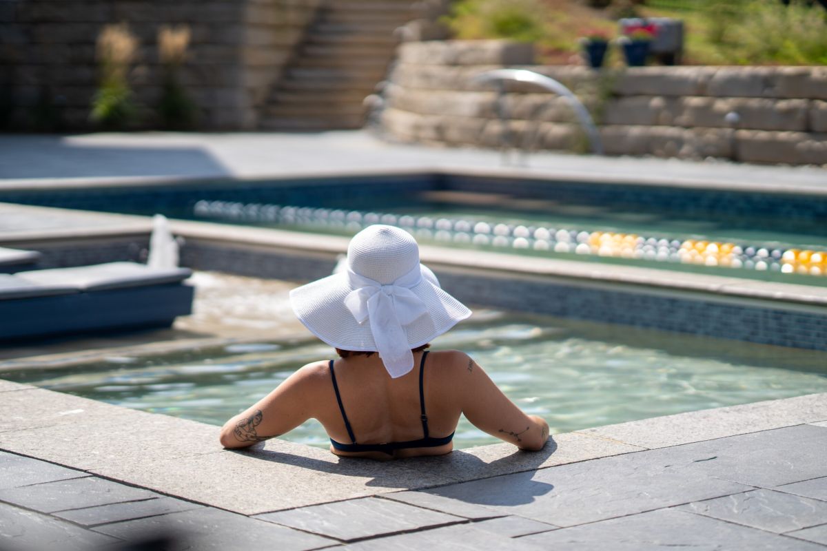 Woman relaxing in a pool